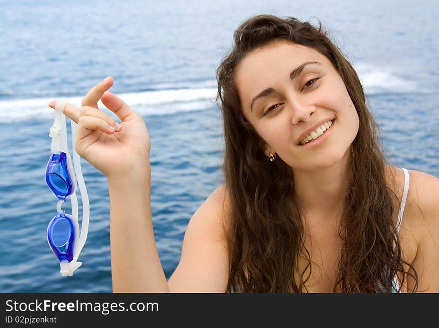 Young girl with swimming glasses