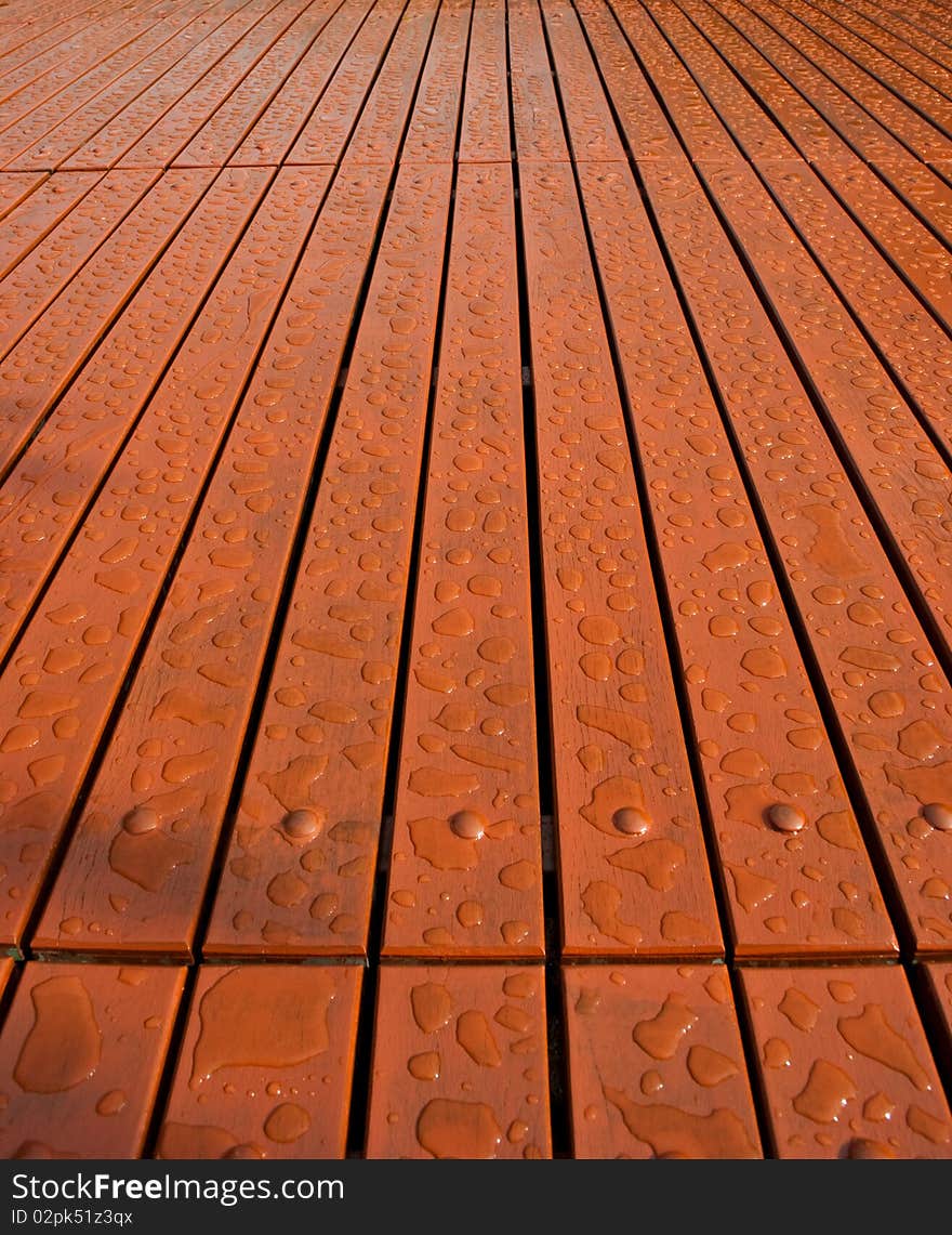 Water Drops On Wood Floor