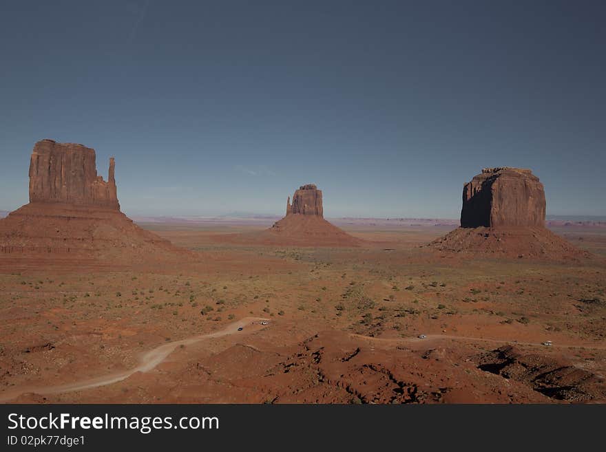 Merrick Butte And The Mittens At Sunset, Monument Valley In The Navajo Tribal Park, Arizona, USA