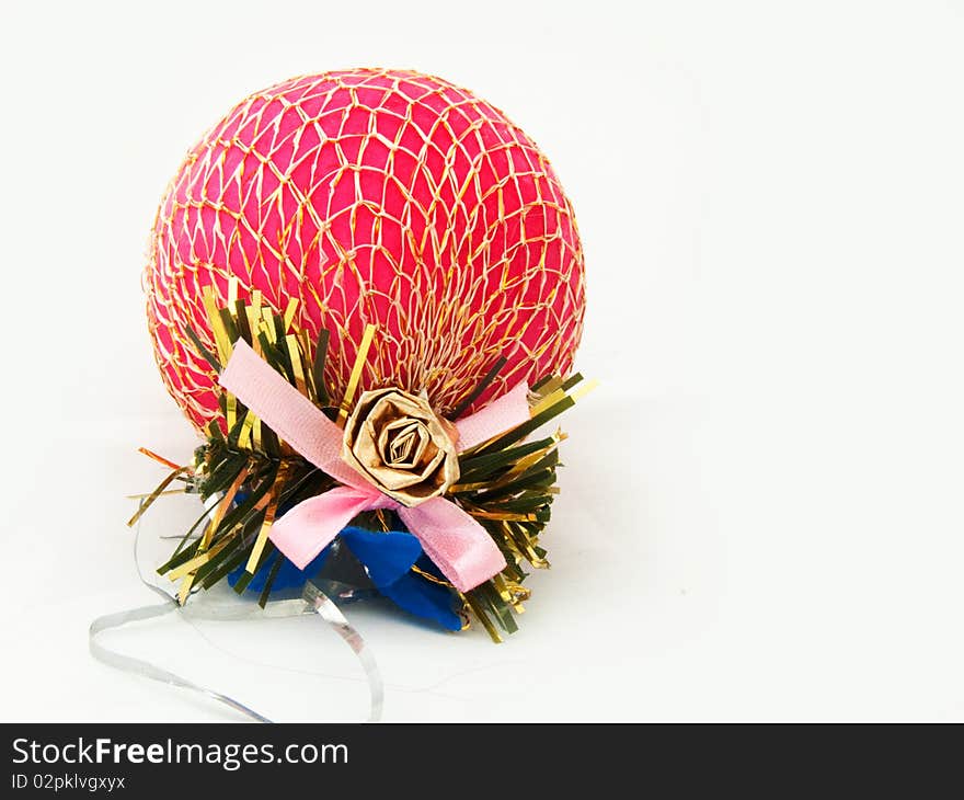 Single red Christmas ornament with pink ribbon