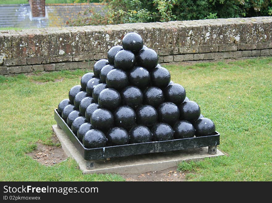 Cannon balls stacked ready for loading into cannon