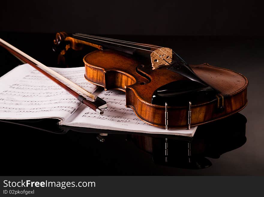 Beautiful old violin on dark background