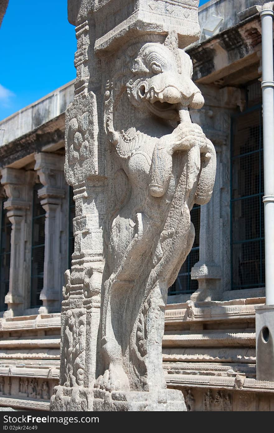 Stone sculptures on pillar in Sri Meenakshi hindu temple in Madurai, Tamil Nadu, India. Stone sculptures on pillar in Sri Meenakshi hindu temple in Madurai, Tamil Nadu, India