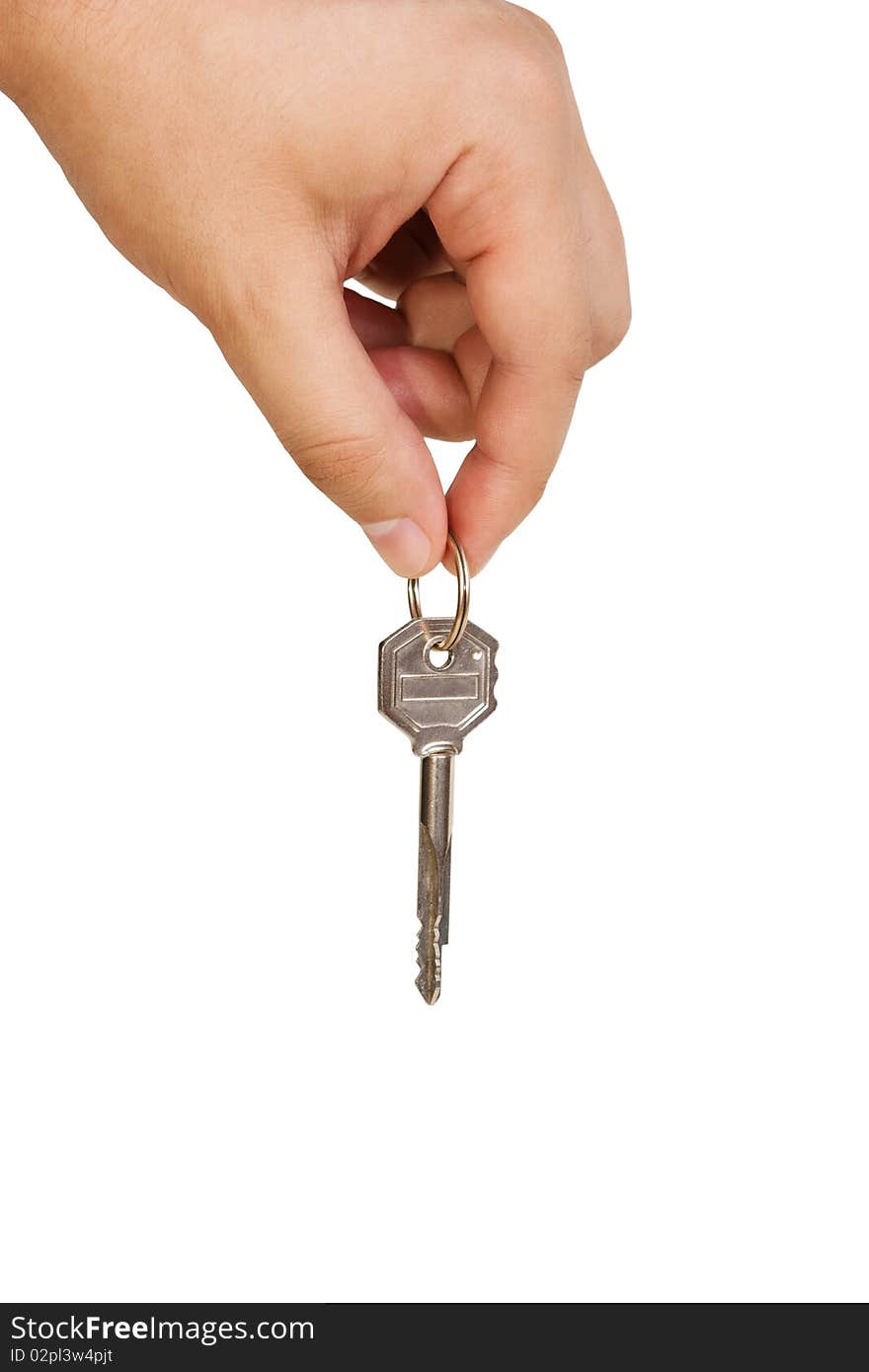 Man's hand with a key isolated over white background