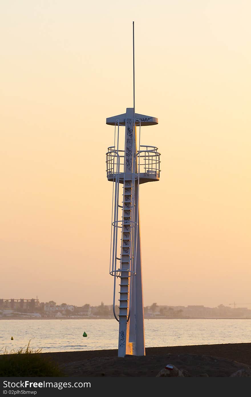 Life guard tower at sunset