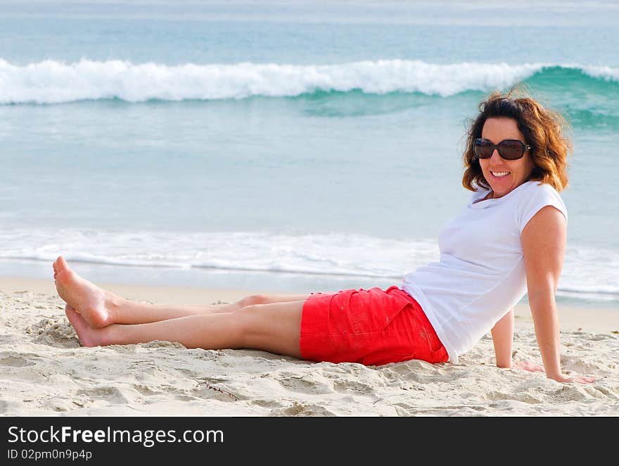 Relaxed And Happy Lady On The Beach