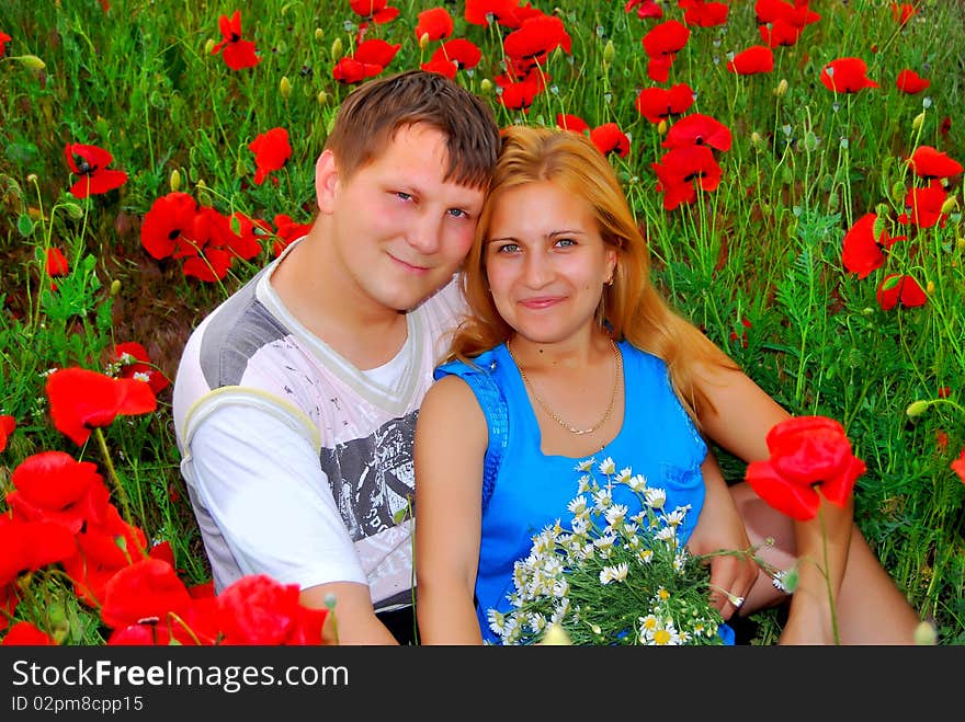 Loving couple in the meadow