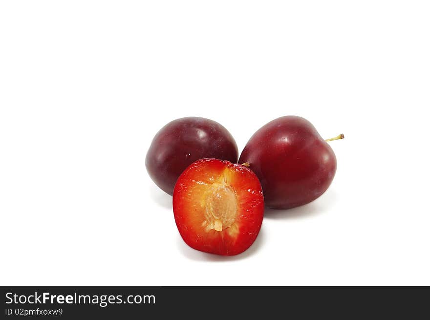 Plum is isolated on a white background. Plum is isolated on a white background