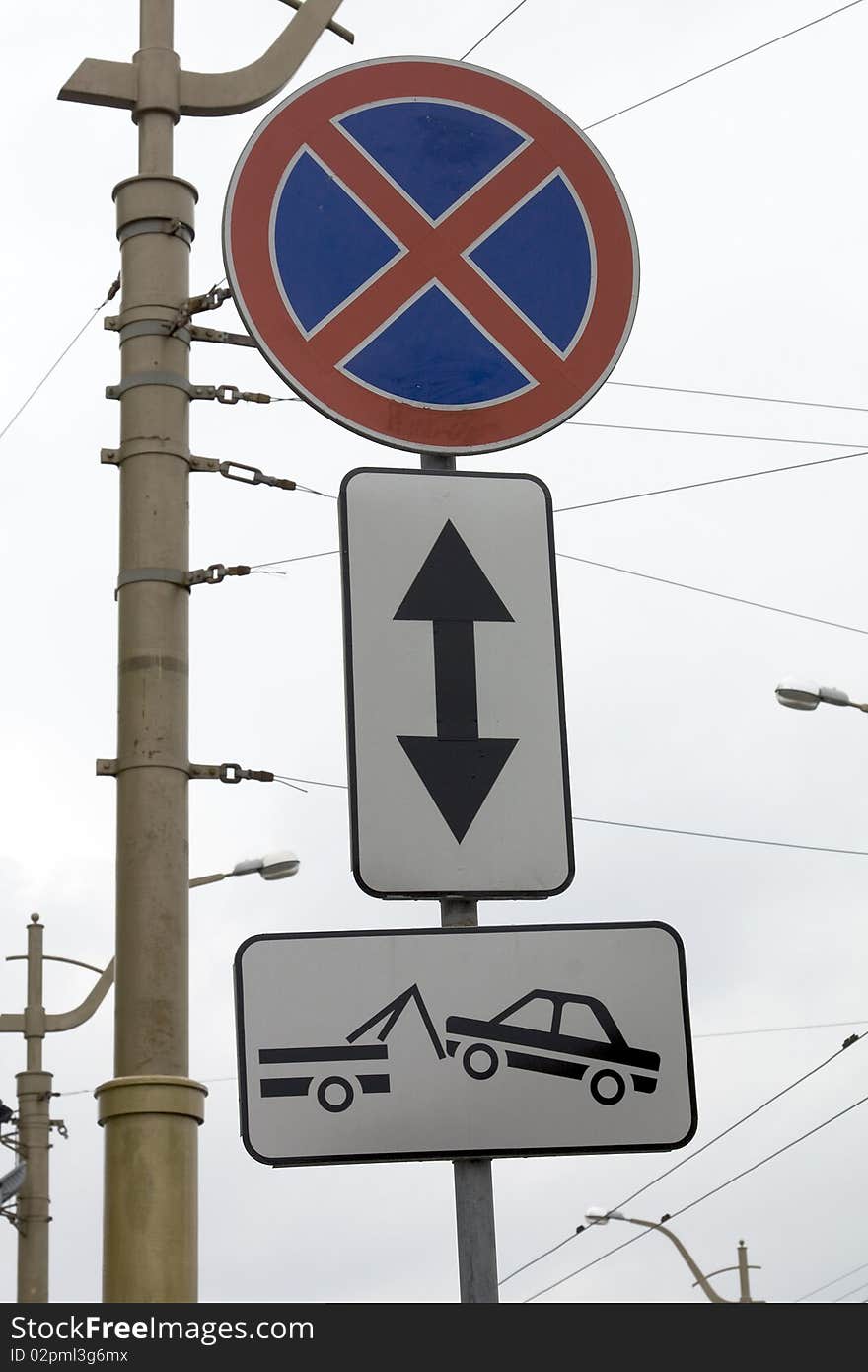 The traffic sign forbidding a stop and parking for which infringement there will be a car evacuation. The traffic sign forbidding a stop and parking for which infringement there will be a car evacuation