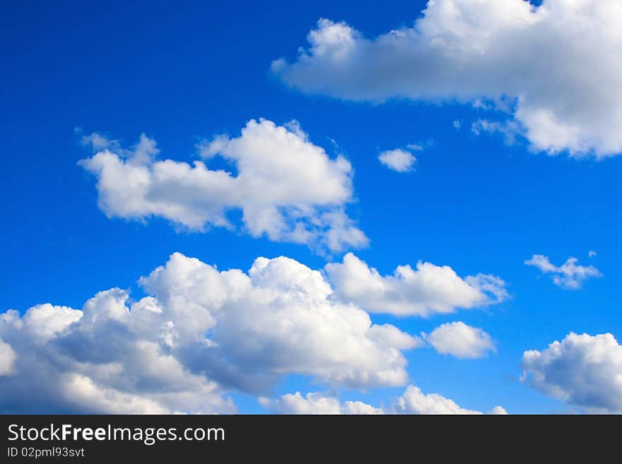 White clouds in blue sky.