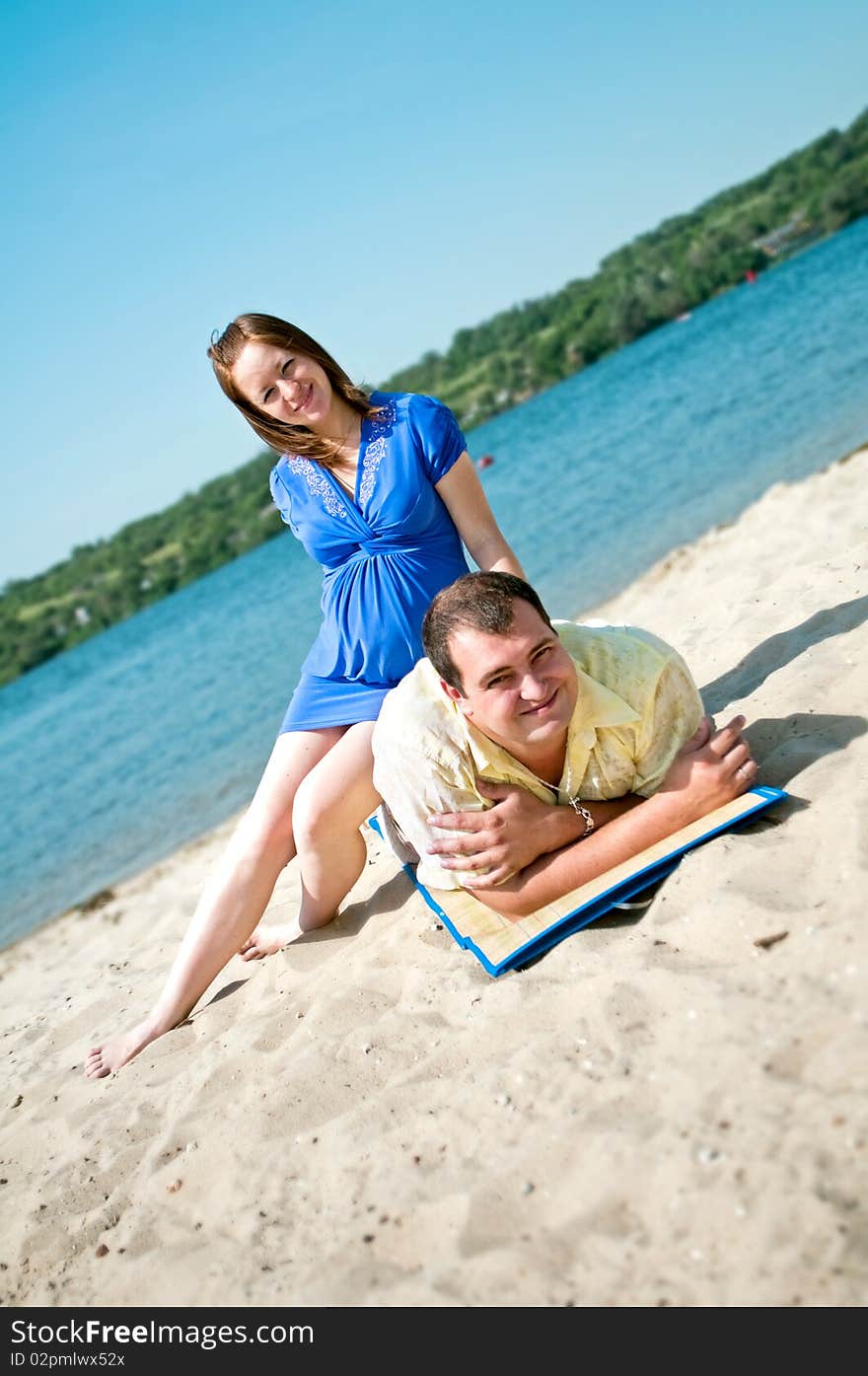 Young married couple on the beach. Young married couple on the beach