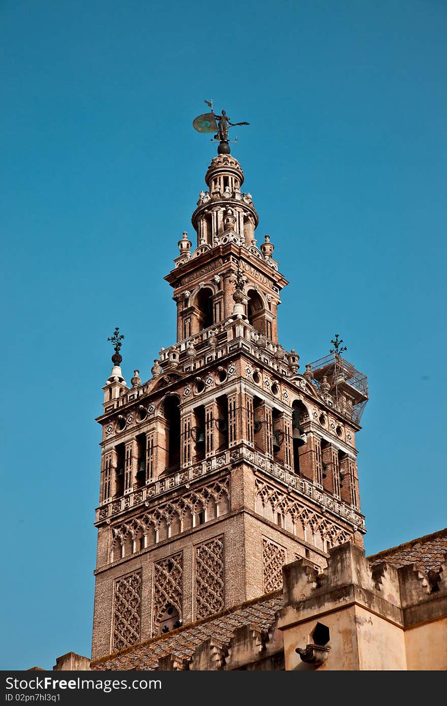 Detail of La Giralda in Seville's cathedral. Detail of La Giralda in Seville's cathedral.