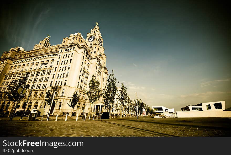 Liver Building In Warm Sunlight With Blue Sky