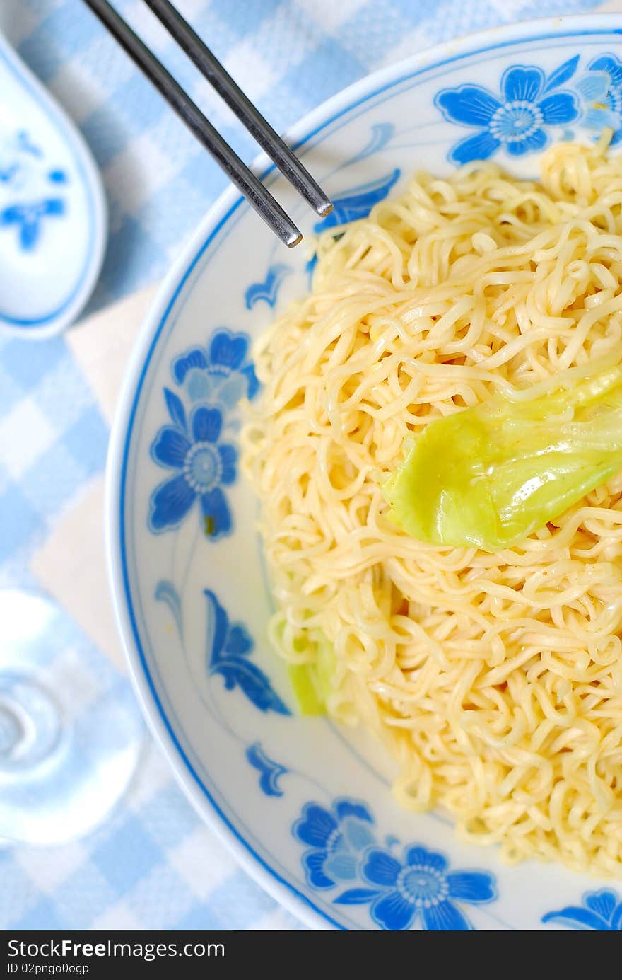 Oriental yellow noodles. For concepts such as diet and slimming, healthy lifestyle, and food and beverage. Oriental yellow noodles. For concepts such as diet and slimming, healthy lifestyle, and food and beverage.