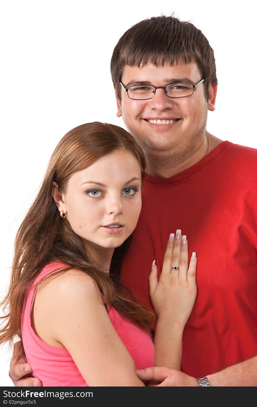 Happy young couple on a white background