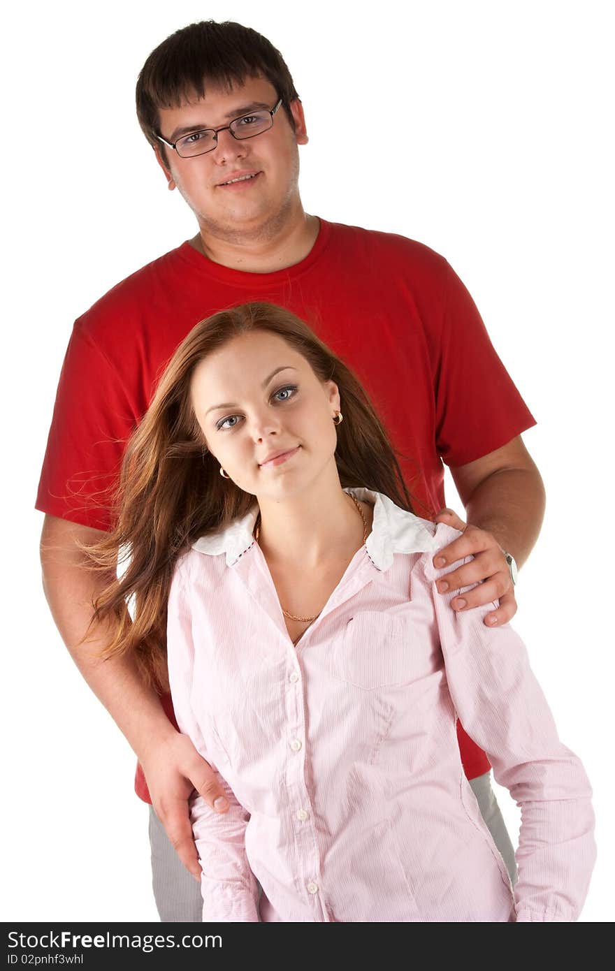 Happy young couple on a white background