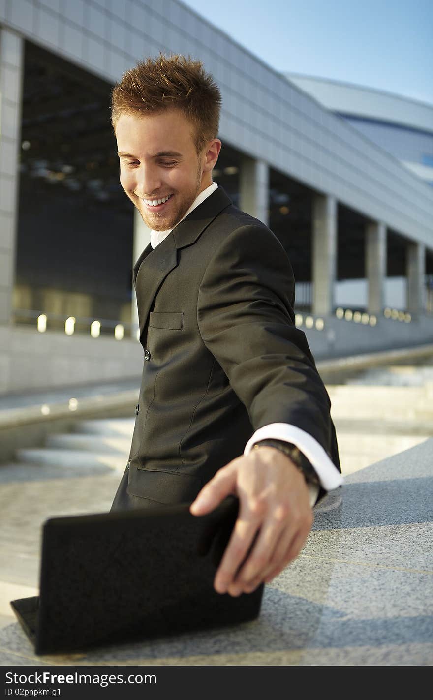 Businessman portrait with laptop. photo. Businessman portrait with laptop. photo