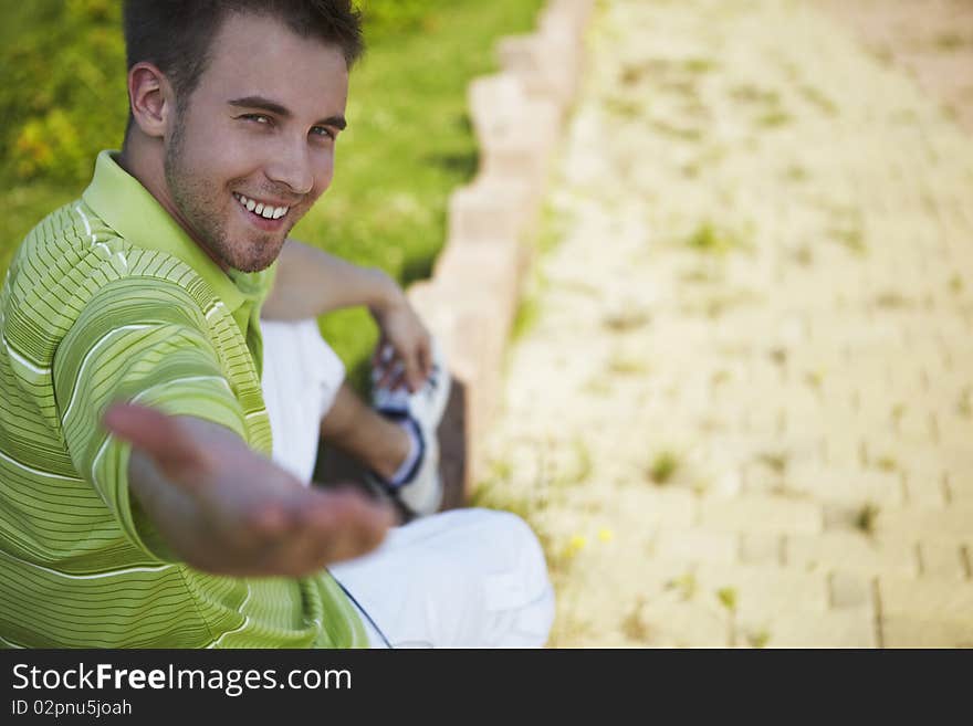 Cheerful guy in a green vest.