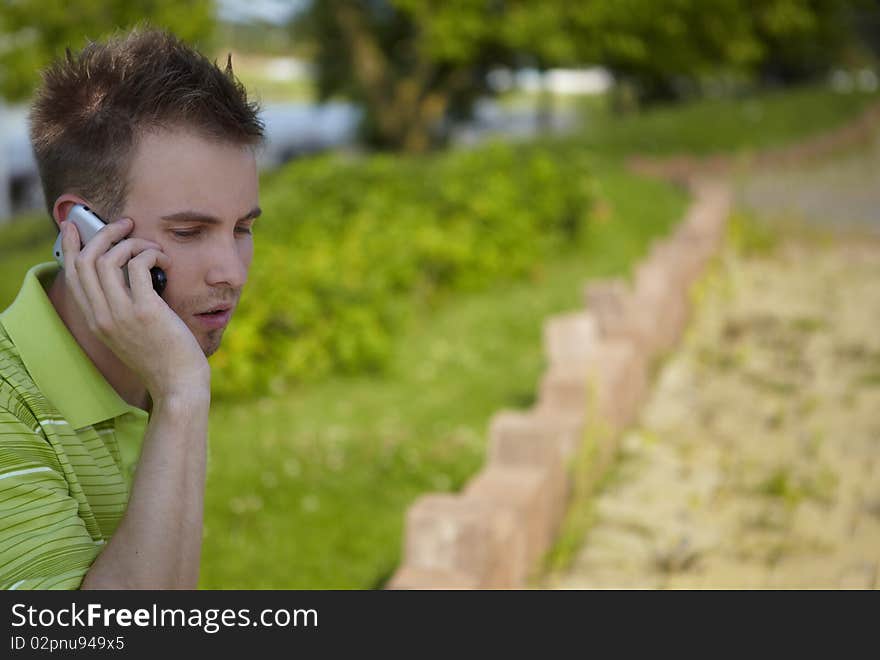 Cheerful guy in a green vest.