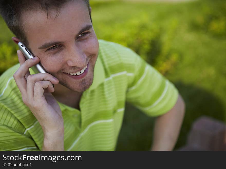 Cheerful Guy In A Green Vest.