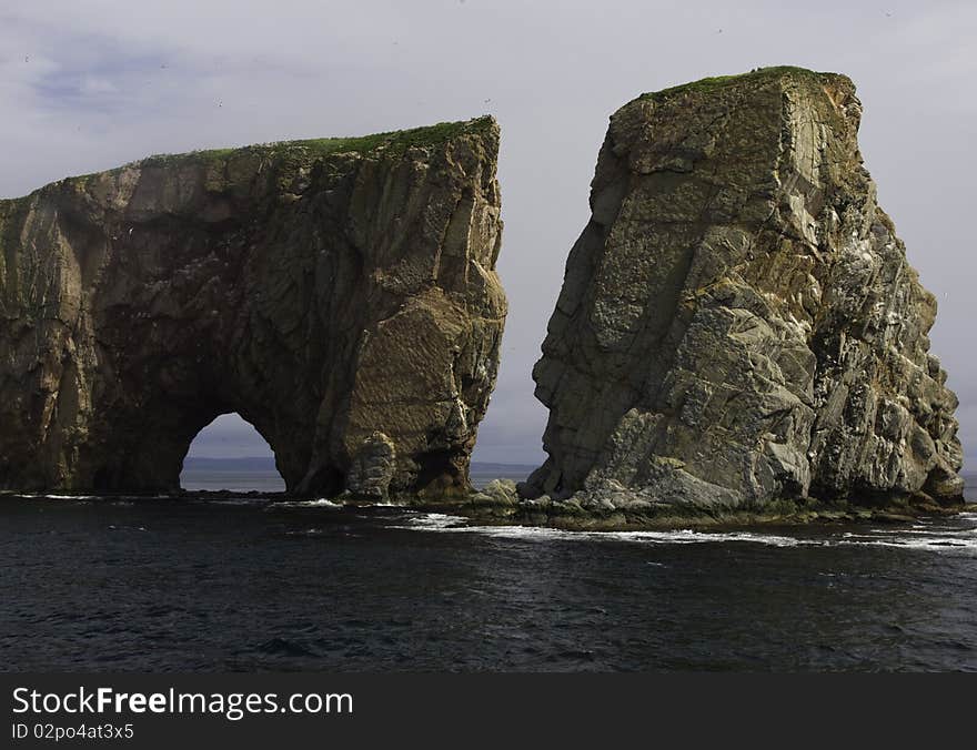 Pierce Rock in Gaspe Quebec as seen from the water