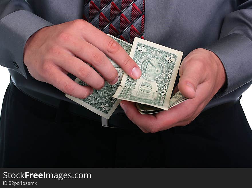 The businessman in a grey shirt and a tie has control over money. The businessman in a grey shirt and a tie has control over money.