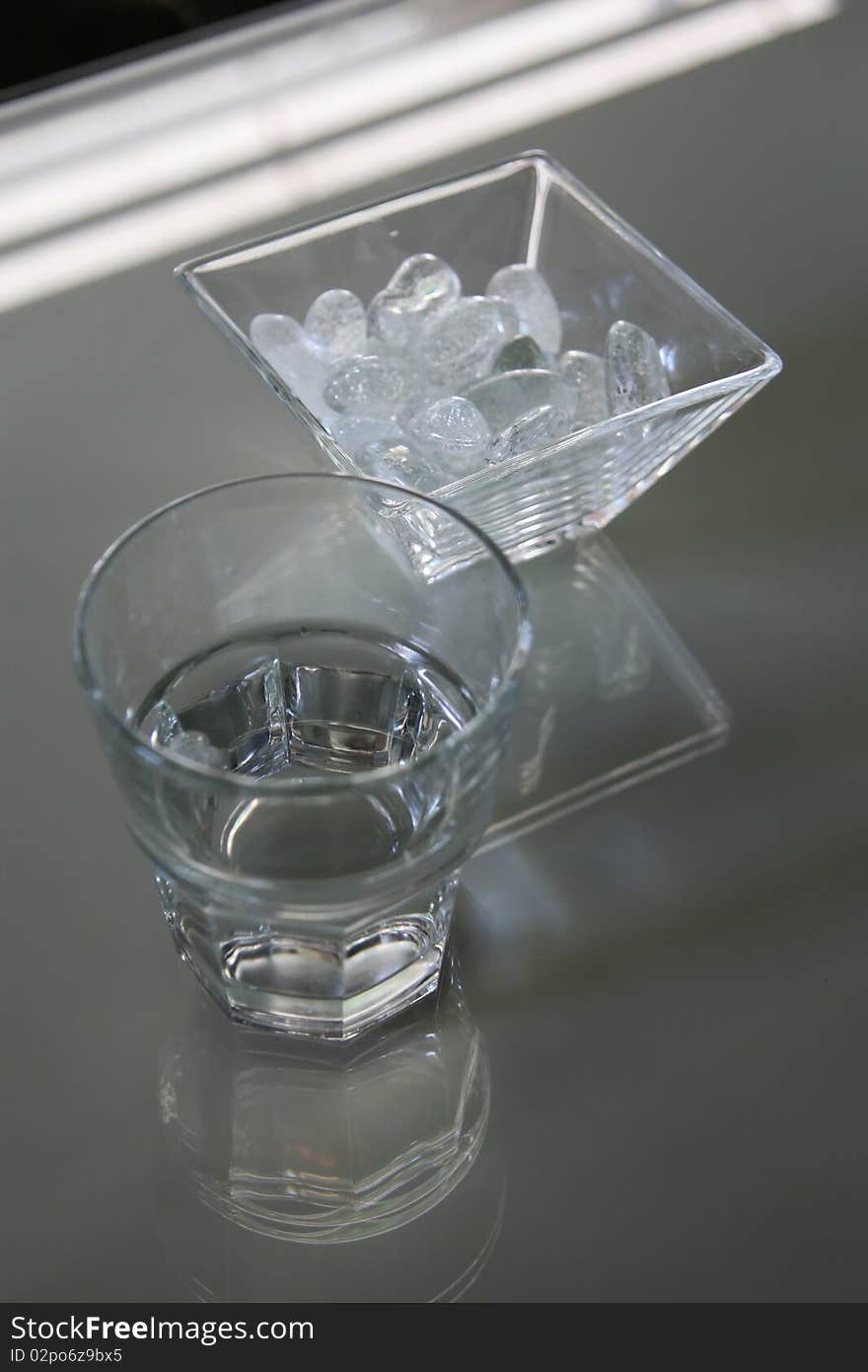 Glass of fresh drinking water, vertical composition. Glass of fresh drinking water, vertical composition