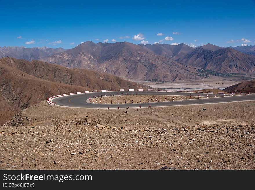 Yellowish mountain road view in tibet of China