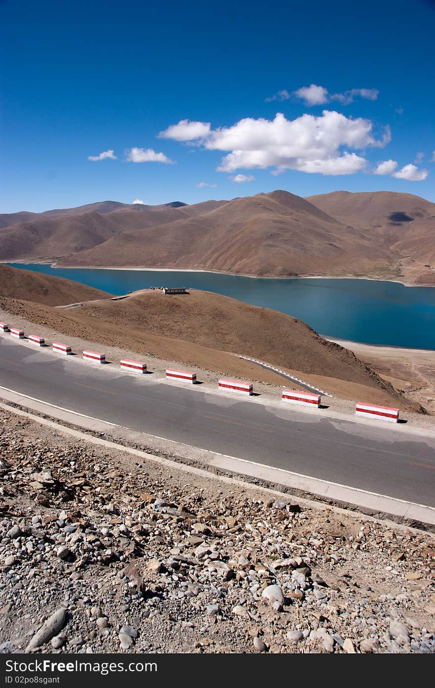 Blue lake with surrounding mountains in great tibet area. Blue lake with surrounding mountains in great tibet area