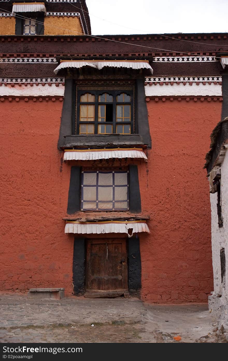 Traditional house with white and red exterior in tibet china. Traditional house with white and red exterior in tibet china