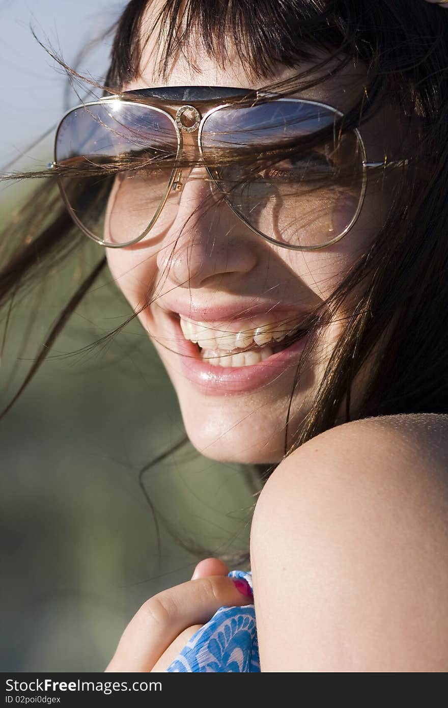 Portrait  atractive young woman smiling stylish sunglasses 70's. Portrait  atractive young woman smiling stylish sunglasses 70's