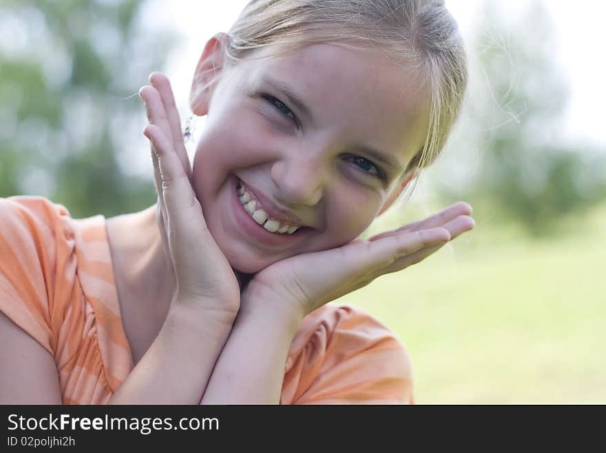 Closeup of a happy girl surprised. Closeup of a happy girl surprised