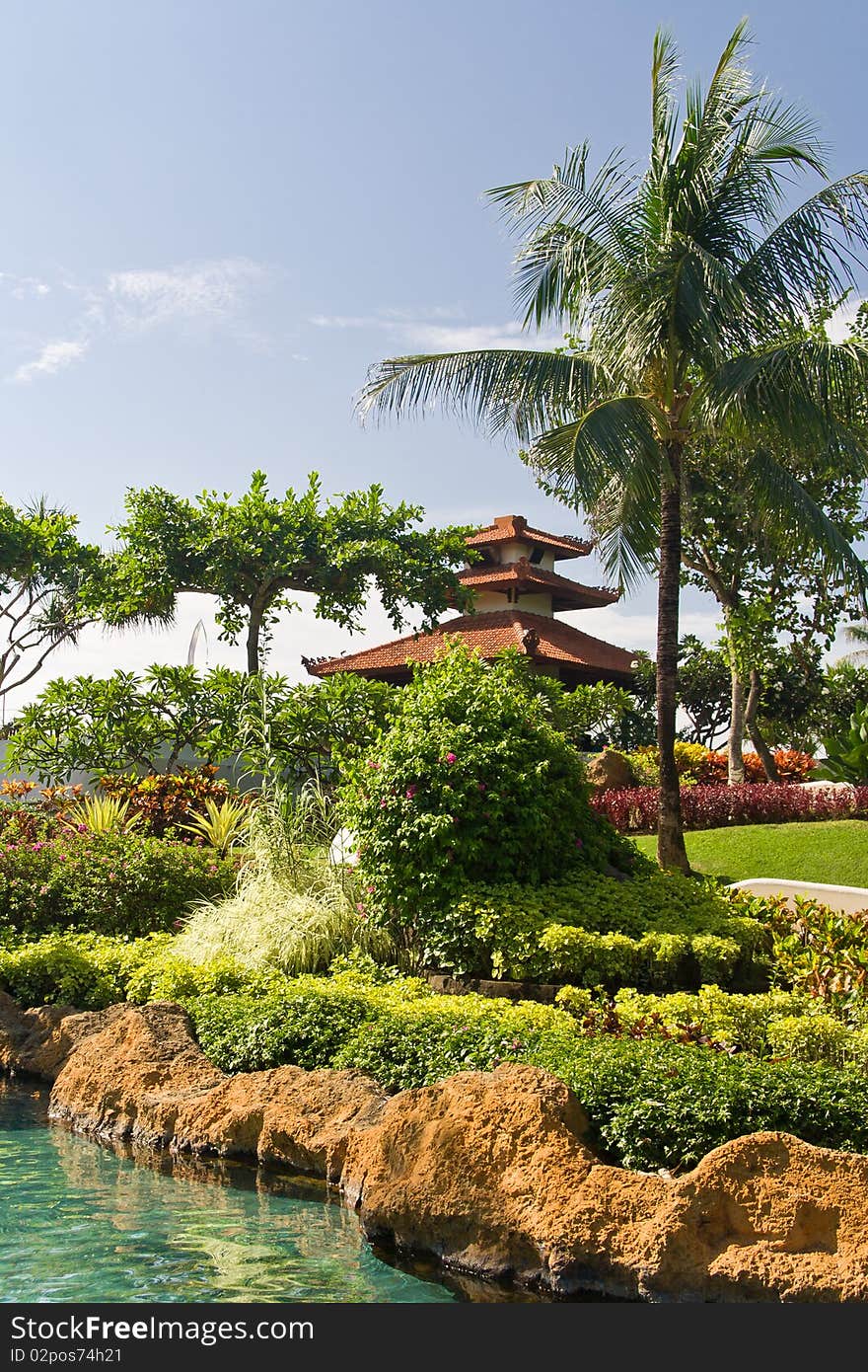 Tropical garden with a pond, Bali island, Indonesia. Tropical garden with a pond, Bali island, Indonesia.