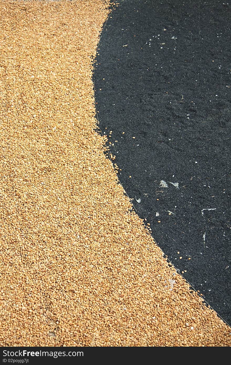 Yellow and black pebble floor