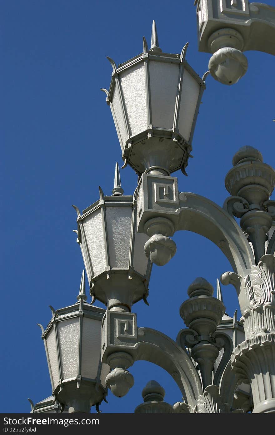 Antique lamps in a row. Antique lamps in a row.