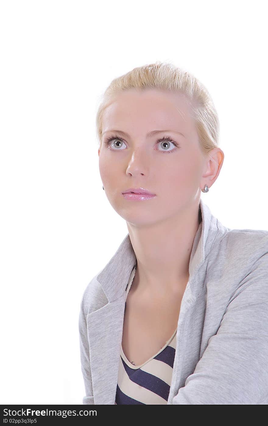 Portrait of a young woman isdolated on white