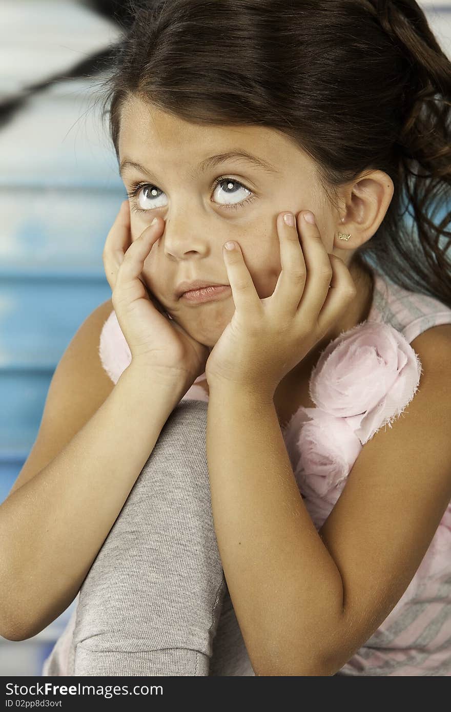 Girl making funny face with eyes upward