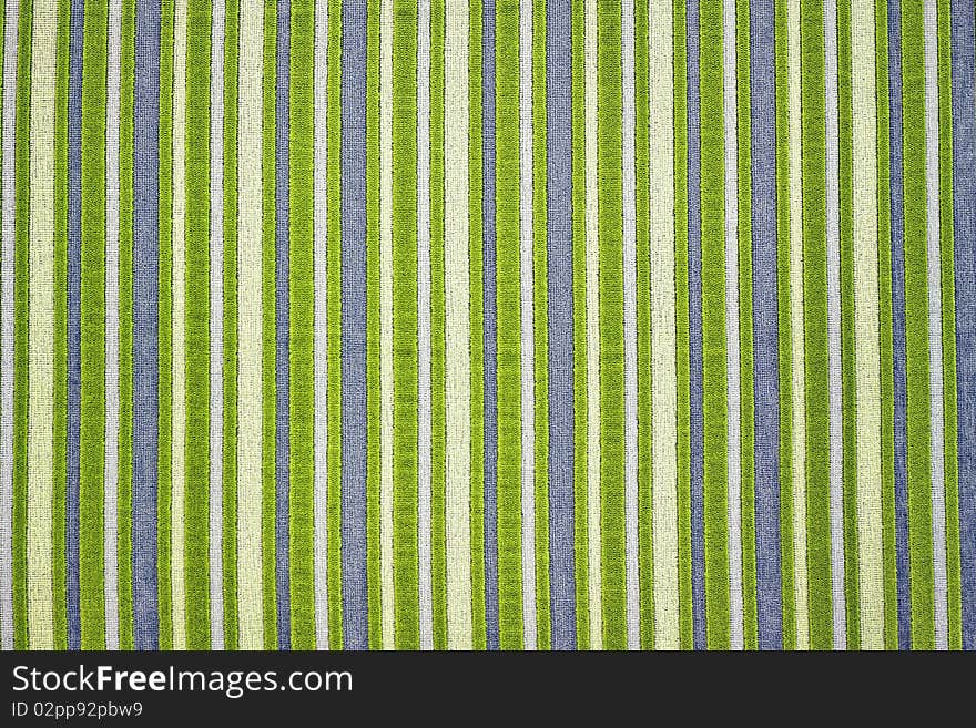 A funky green striped background or texture. A funky green striped background or texture