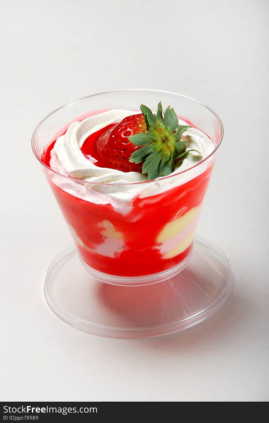 Mousse with strawberry ice cream on a white background