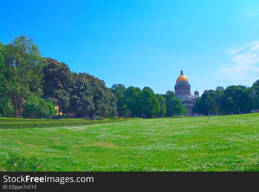 The majestic building of St. Isaac's Cathedral. Kind of the park. St. Petersburg.