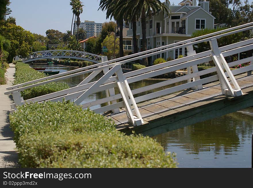 Two bridges over a canal in Venice, California. Two bridges over a canal in Venice, California.