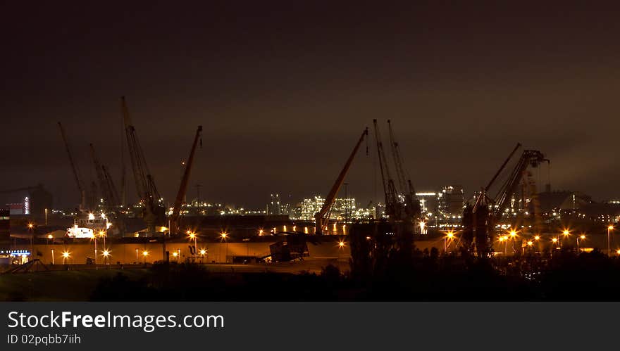 View of the harbour cranes at night