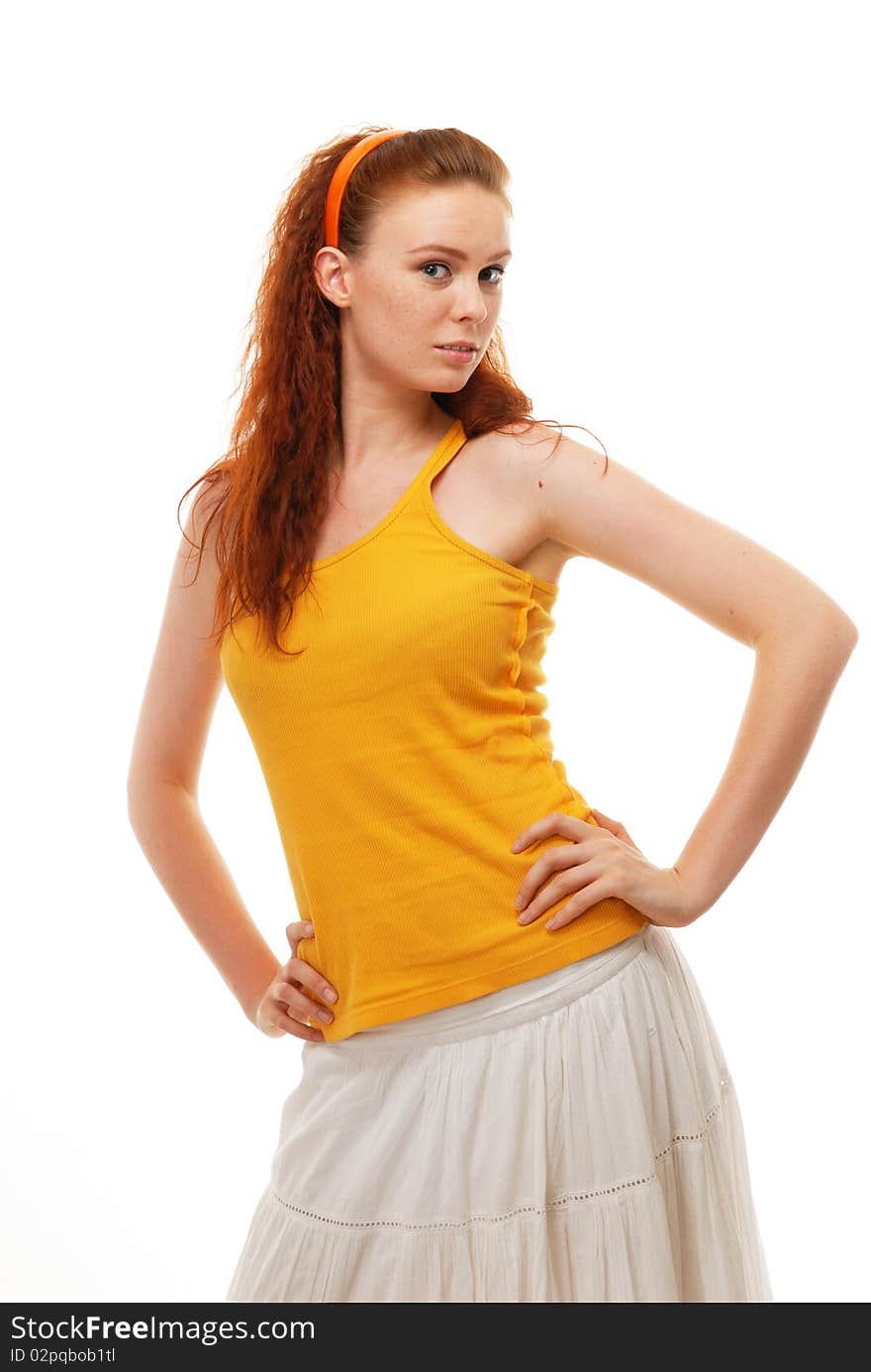 Redhead girl poses in the studio. Redhead girl poses in the studio