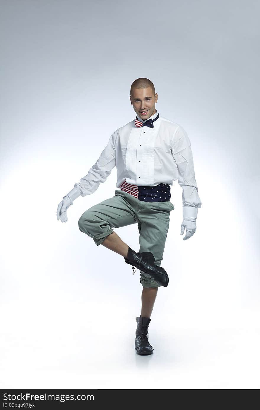 Cool dancer in white shirt and American flag belt and bow tie. Cool dancer in white shirt and American flag belt and bow tie