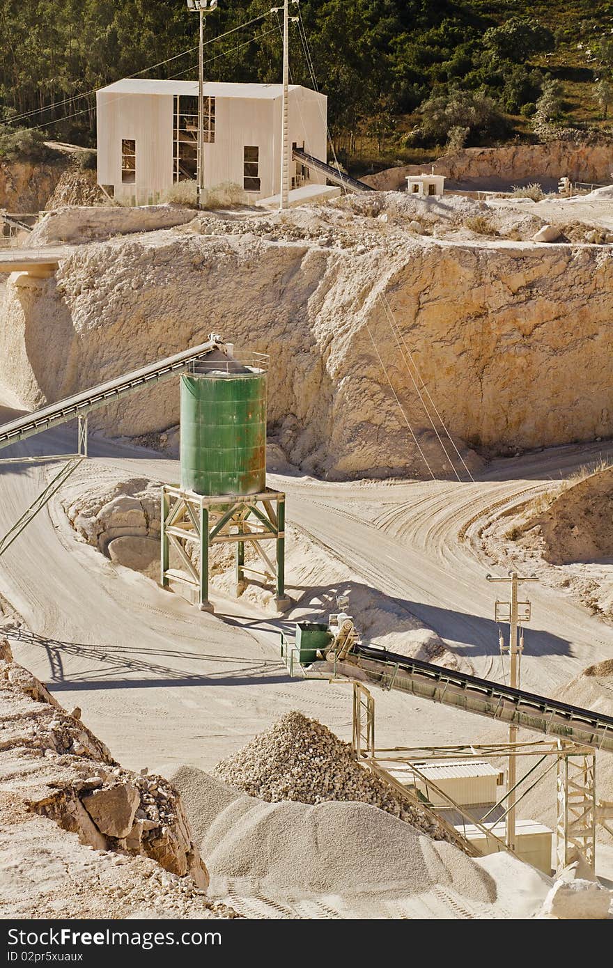 View of a stone and sand modern quarry and part of the infra-structure. View of a stone and sand modern quarry and part of the infra-structure