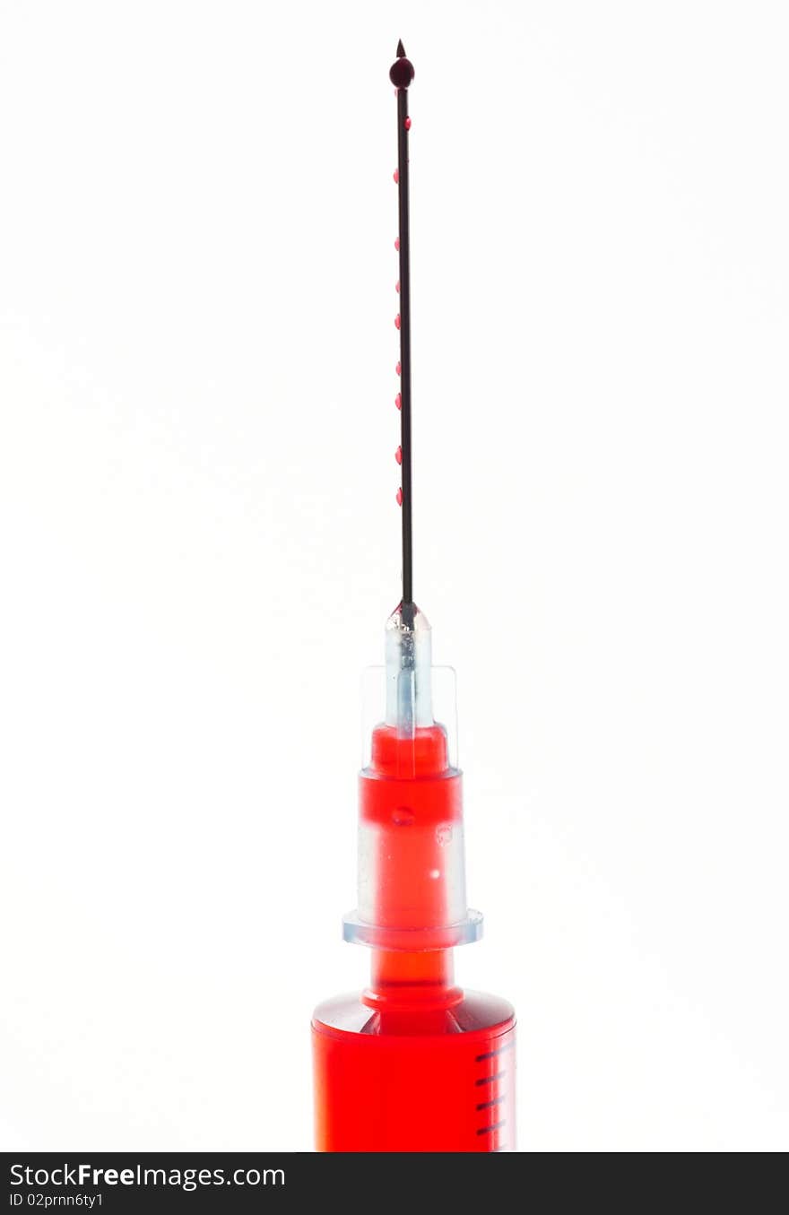 A syringe isolated on white