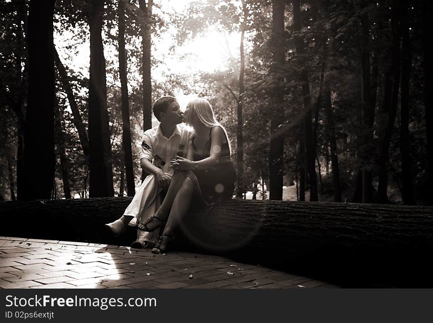 Young couple kissing in the park