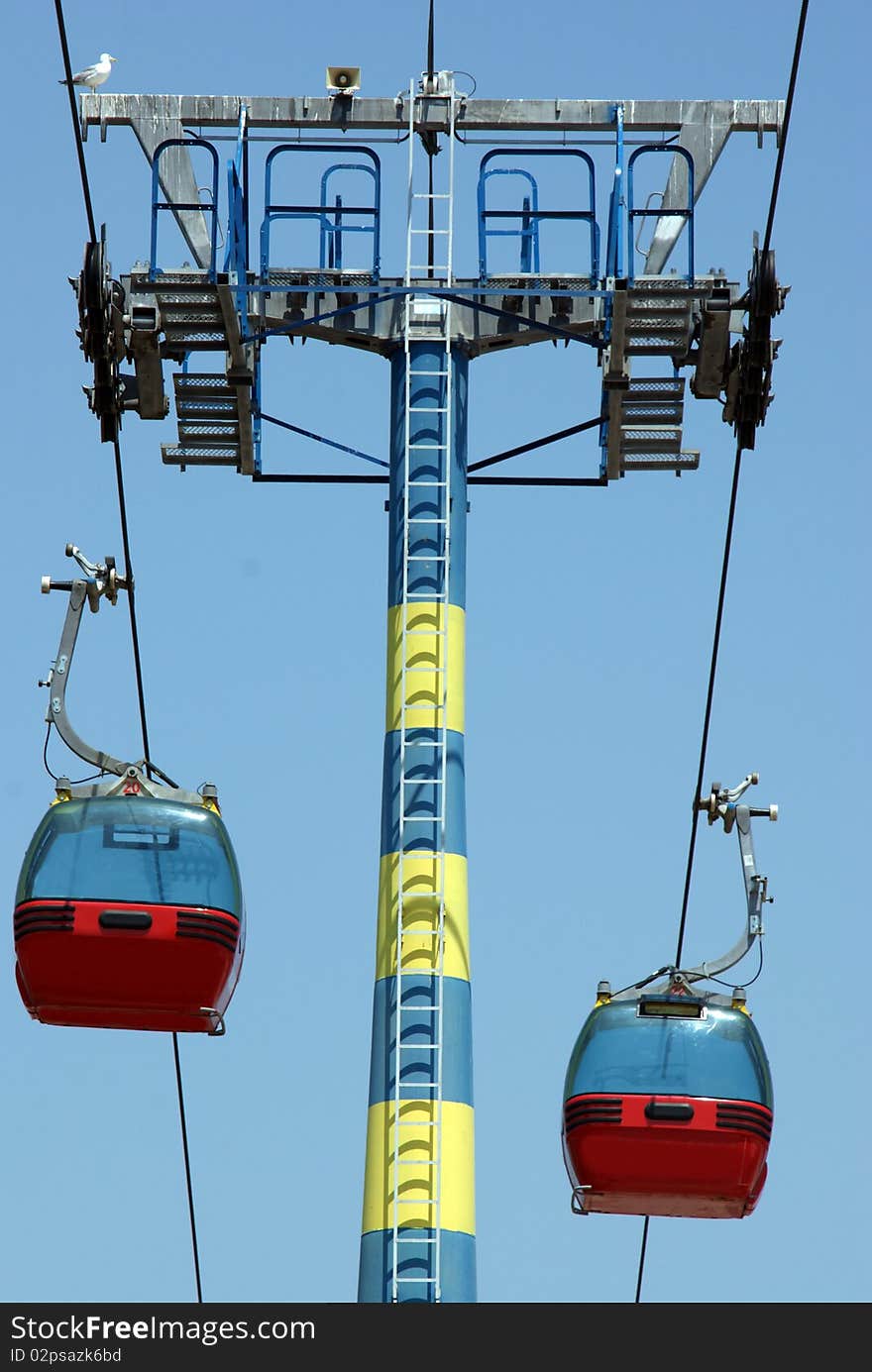 Transportation: two cablecars on a blue sky. Transportation: two cablecars on a blue sky