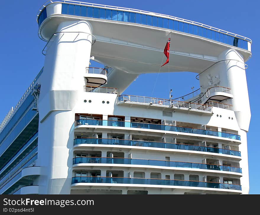 Details of the cruise liner stern stucture on blue sky.