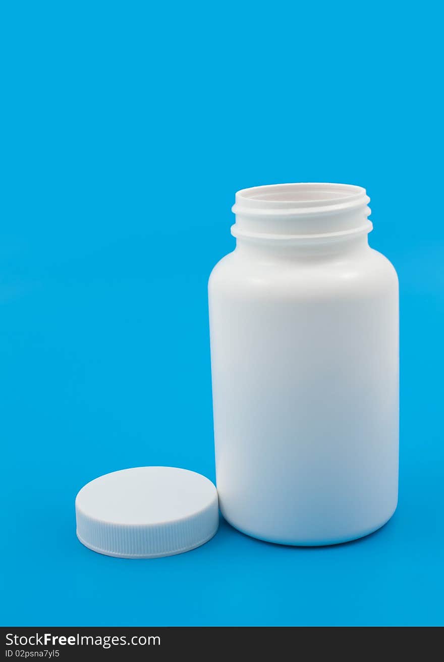 Empty medical can on blue background